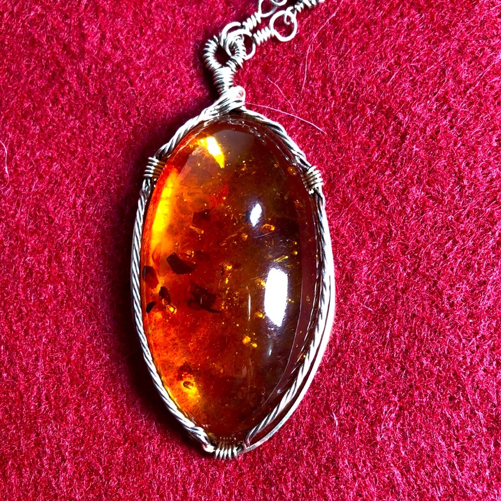 Artisan necklace. Amber pendant.